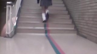 Hot Asian girl gets skirt sharked up in empty corridor