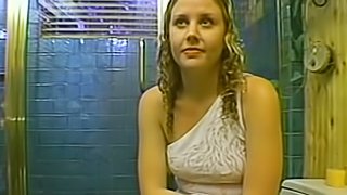 Hot blonde jerks her boyfriends big cock in the bathroom