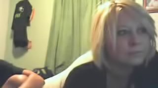Blonde emo girl bares her huge tits on the camera