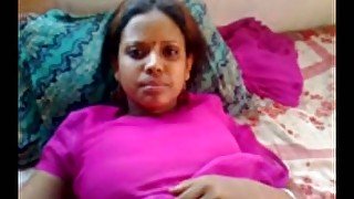 Submissive genuine Indian dark skin lady in sexy red outfit