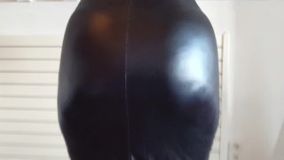 He pulls up her latex skirt and shows her bare big white ass