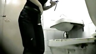 Beautiful pissing movie of some babes in the toilet