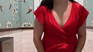 Hot brunette in red dress masturbates in a public restaurant