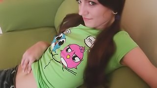 Teenage slut sheds black panties and a green top to be taken on an olive-colored sofa.