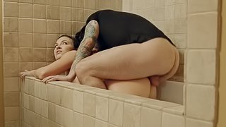 Lily Love gets her tiny pussy pounded by a friend in the bathtub