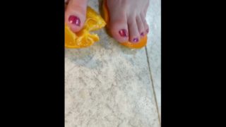 Orange crushed by virgin feet 