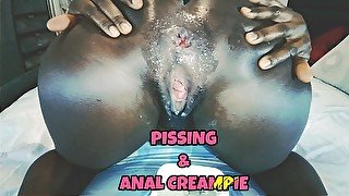 Ebony Pissing before Getting an Anal Creampie