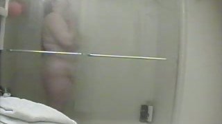 Spy video of my friend's chubby wife taking a shower
