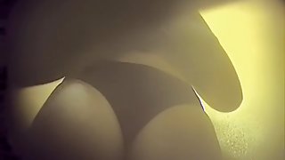 Hidden cam in changing room girl showing her bikini boobs
