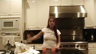 Brunette sucks and doggystyle fucks her bf in the kitchen