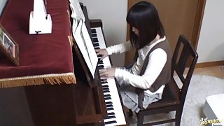 Piano teacher rear fucks his pupil across the piano keys