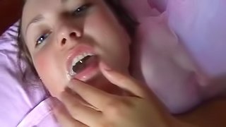Sexy Tanya is touching sperm on her lips
