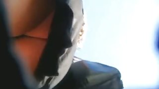 Making an upskirt shot upside-down while on the move