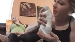 cuties sniffing white socks