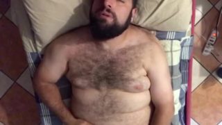 Big hairy bearded bear horny on the bed solo jerk off moaning a lot. Orgasm face. Beautiful Agony
