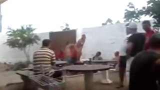 Naked latina gets her pussy eaten out by a fat guy on a table in a bar
