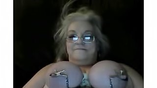 Addicted granny talks dirty in her bedroom