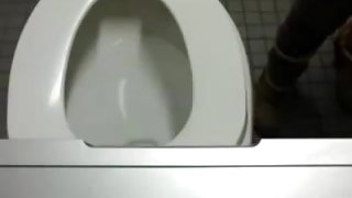 Big titty babe dildos her pussy in public bathroom