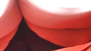 close upskirt of woman in red dress