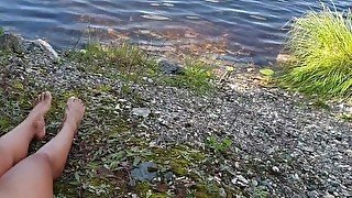 Real couple have risky outdoor sex next to a lake