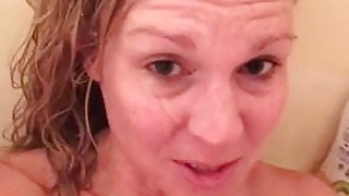 MILF getting a facial in the shower