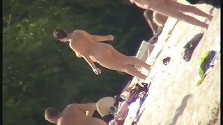 Naked bimbos at the beach on beach voyeur spy cam video