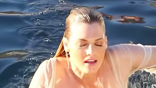 Brigitte Anne fondles her wet body on the poolside