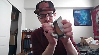 Cute Young Nerd Opening a Pack of Magic the Gathering Cards