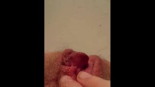 Moaning from pleasuring hairy pissing pussy