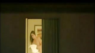 Neighbor spied topless in her bedroom