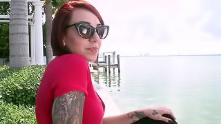 Tattooed redhead Mila Treasure blows and gets stunningly fucked