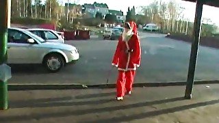 Santa girl doing a striptease on camera