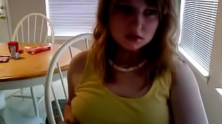 Homemade video of a horny teen girl messing with her tits