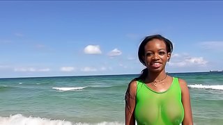 Curvy black slut in a sheer swimsuit fucking a hung white guy