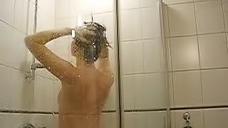 Lovely girl wet in the shower