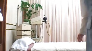 Japanese girl fucked in front of hidden cameras in a massage parlor