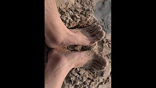 Dirty man feet sand beach and sunny day foot fetish