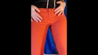 Long held it and peed in pants - pissing standing up in orange jeans