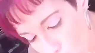 Homemade video of a short-haired redhead sucking cock