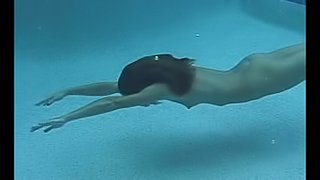 My mischievous girlfriend jacks off my cock underwater
