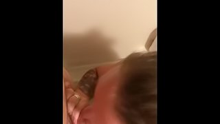 Tattooed Milf gives blowjob in shower, gets facial