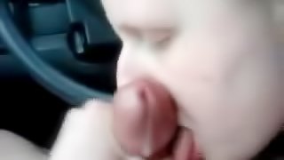 Blonde chick sucking a small and limp dick in a car