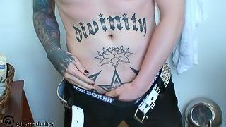 This gay guy has some hot tattoos and a hard cock ready for some action