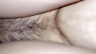 Girl gets her hairy pussy closeup doggystyle fucked and moans