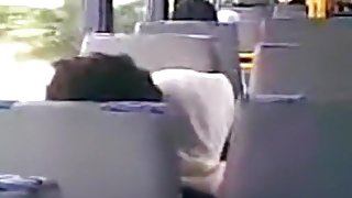 Voyeur tapes an arab hijab girl blowing her bf's cock in a public bus