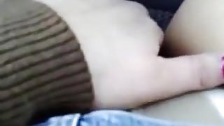 Chubby milf masturbates her shaved pussy in the car at the parking lot of a local supermarket