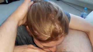 The step-sister gives a deep blowjob to her brother who has just arrived