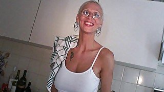 Blonde mature Melizza More with glasses takes a fat cock in her mouth