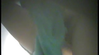 Spy cam amateur in dressing room shows bushy nub