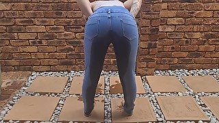 Hot girl desperate jean pissing  clothed wetting